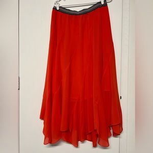 Anthropologie long, flowy skirt in beautiful bright orange color.